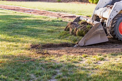 how to properly grade with a skid steer|leveling ground with skid steer.